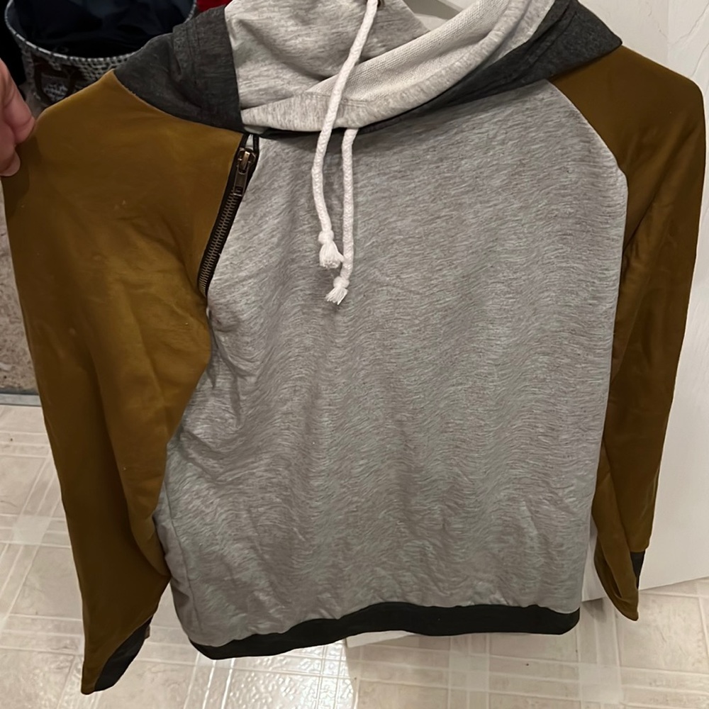 Cute boutique hoodie with diagonal zipper